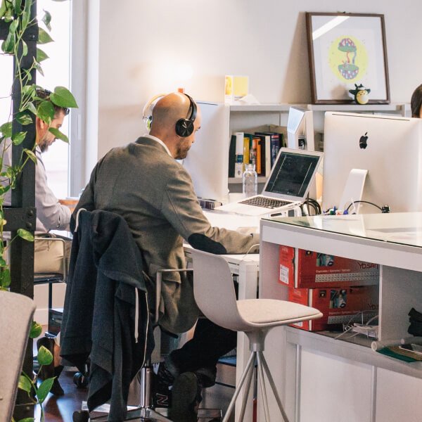 Driven by passion to teach Person sitting on desk